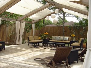Exterior Outdoor Patio Shades And White Curtains Over On Brown inside dimensions 1280 X 960