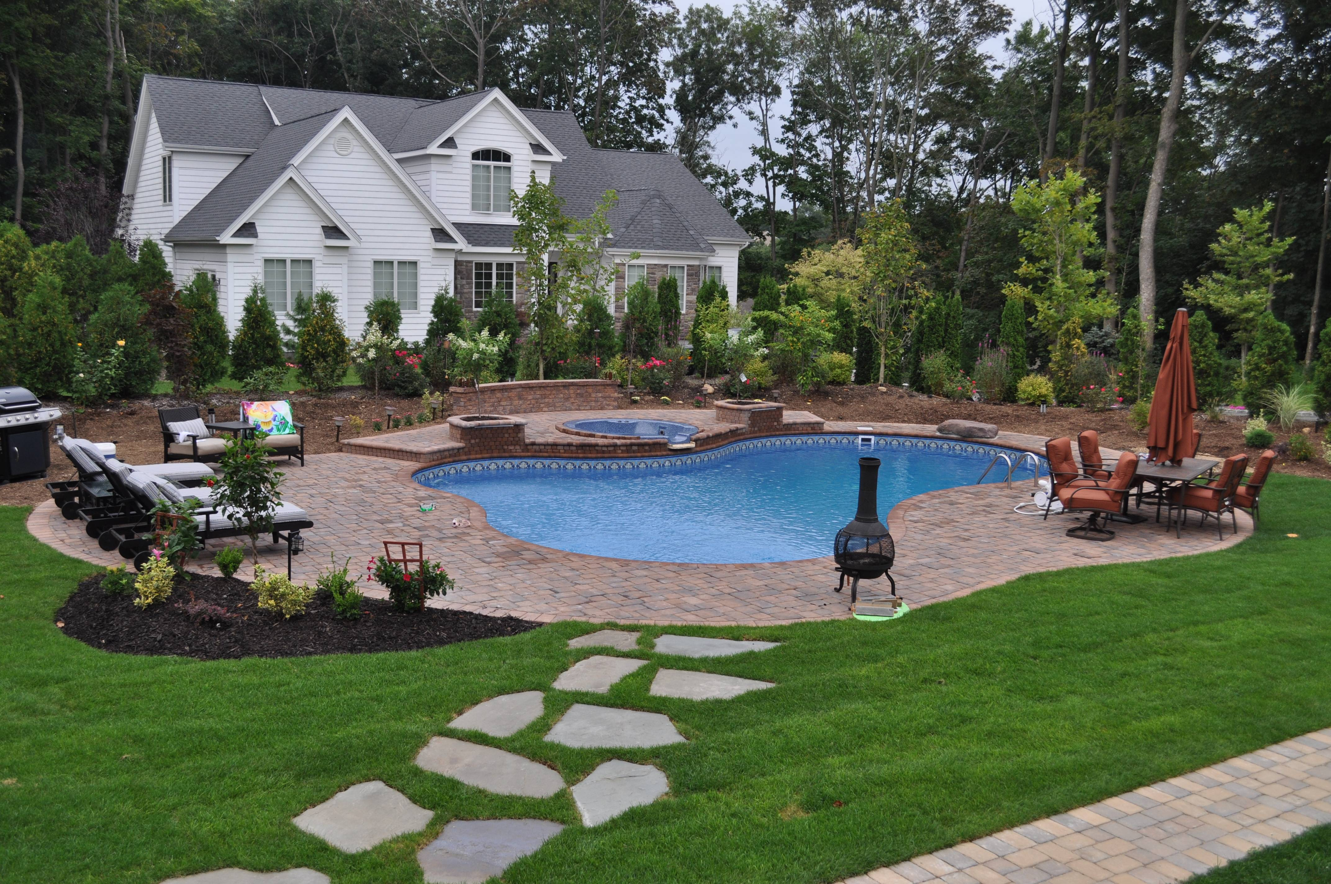 Landscaped Backyard Design With Free Form Vinyl Pool Spillover Spa with size 4288 X 2848