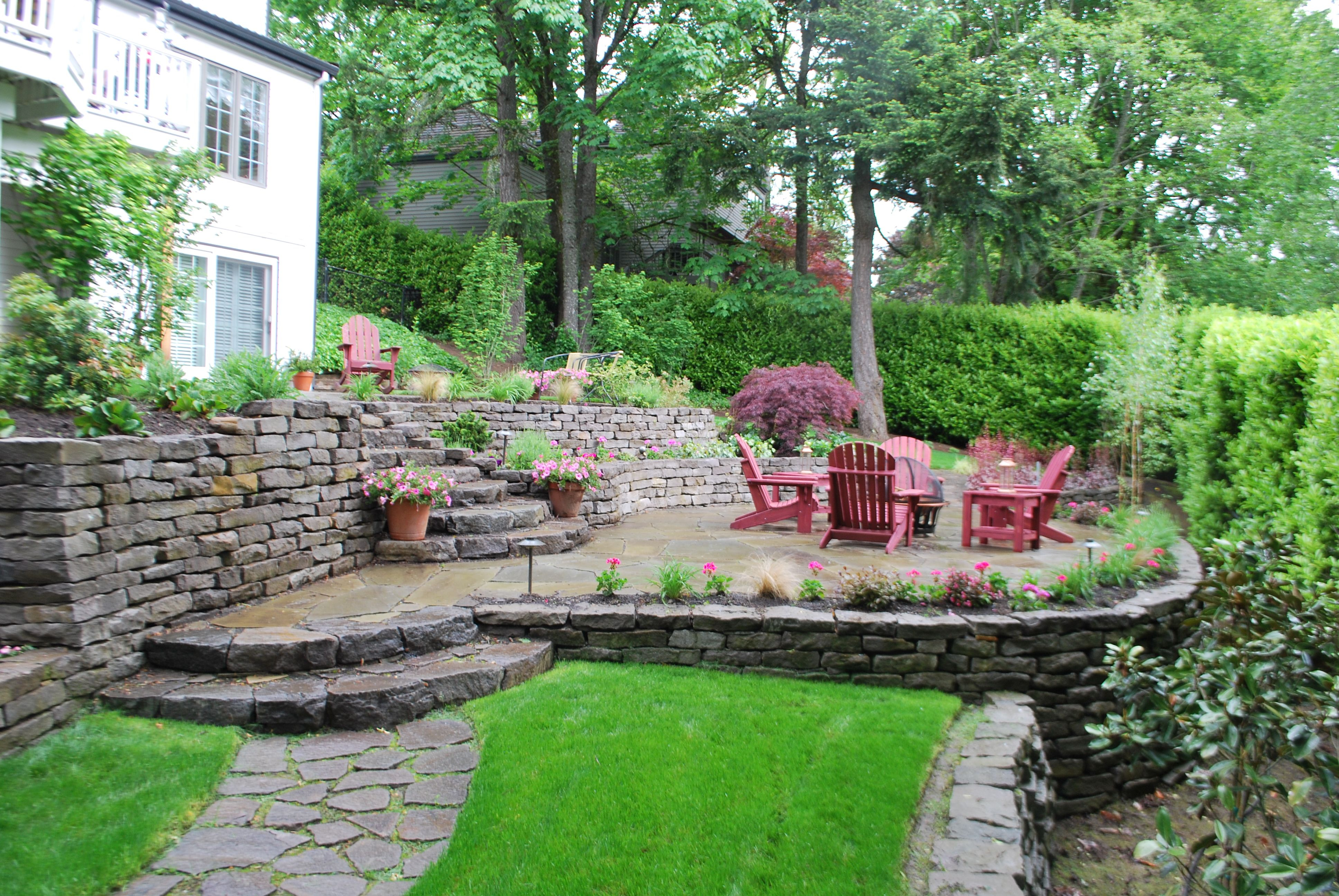 Tiered Patio Design Sloping Away From Home With Landscaping And Fire with sizing 3872 X 2592