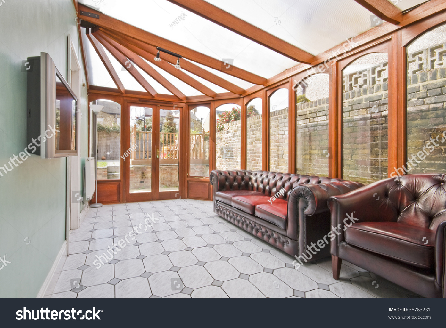 leather sofa in conservatory